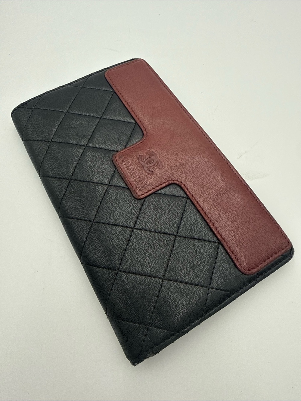 CHANEL Black Quilted Leather Wallet with Bordeaux Accent